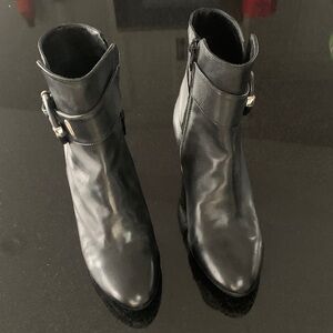 Sleek Black Ankle Boots with Buckle Detail